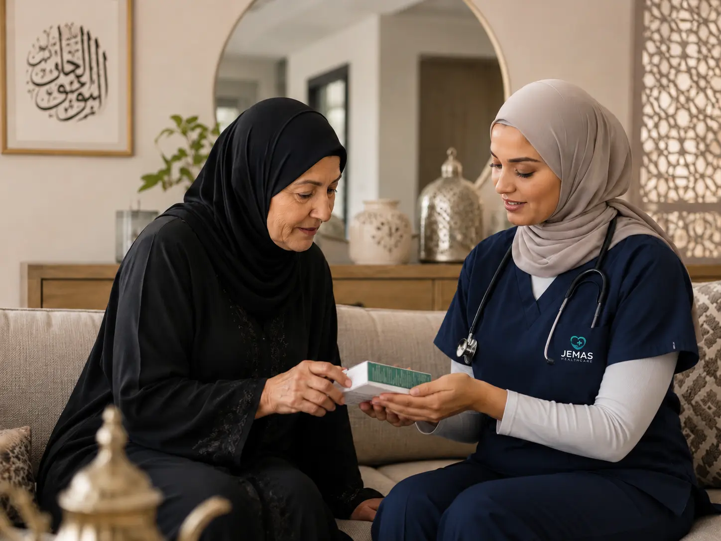 Jemas nurse explaining a medication box to an elderly woman at home in Qatar